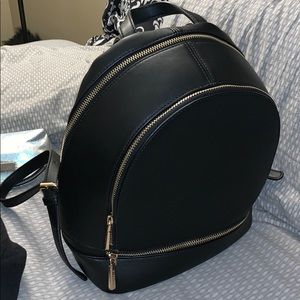 Black small travel size backpack